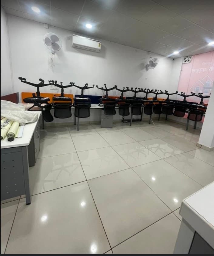 Office floor cleaned with chairs arranged after service